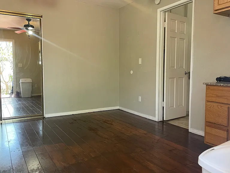 View from entrance to studio showing closet, bathroom door