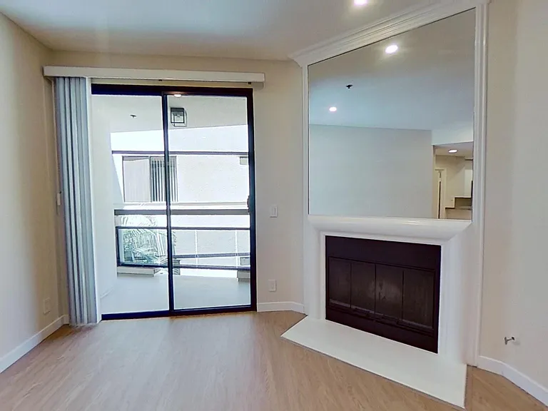 Fire place and balcony of apartment #213
