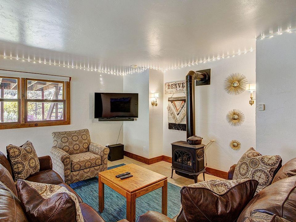 Spacious living area with large screen TV