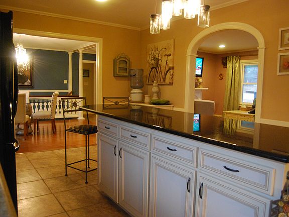 kitchen with archway to LR