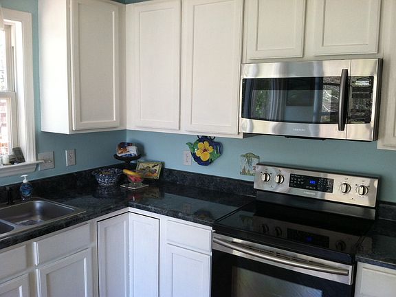 New floor, counters & applia