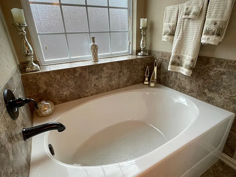 Primary bath soaking tub