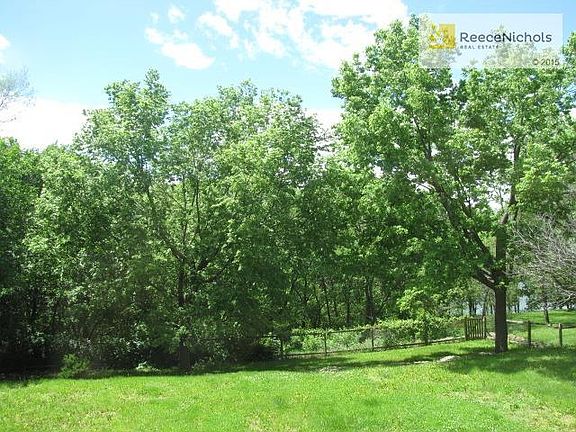 Large back yard backing to greenspace and pond.