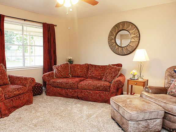 Newer carpet and fresh paint in the living room