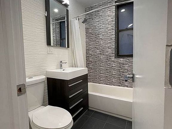 5th image of 643 W 171st St APT 6