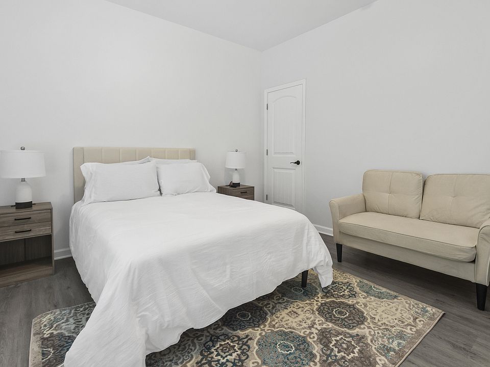 Bedroom 3 (Side Corner View of Full-Size Bed)