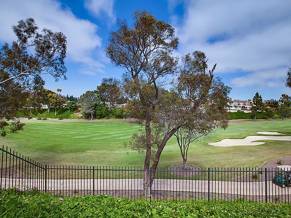 Golf course next to apartment community.