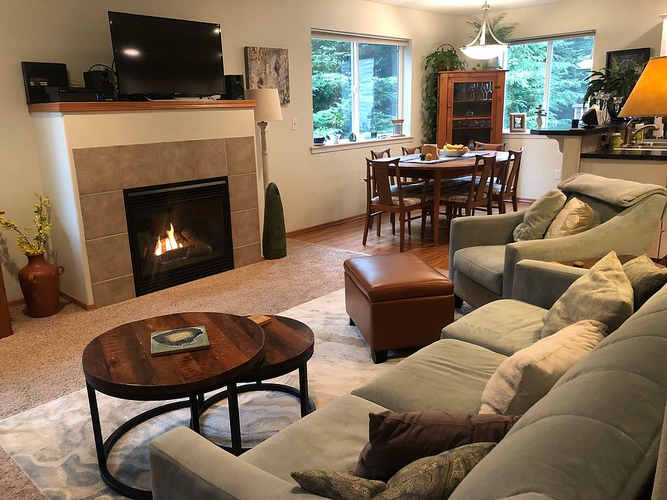 Living room, dining room and fireplace.