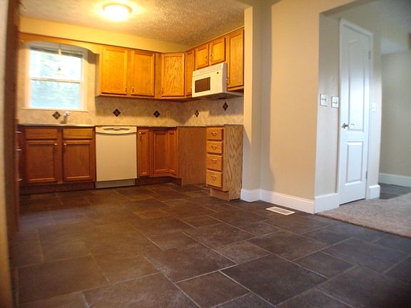 kitchen with plenty of cabinets plus a pantry