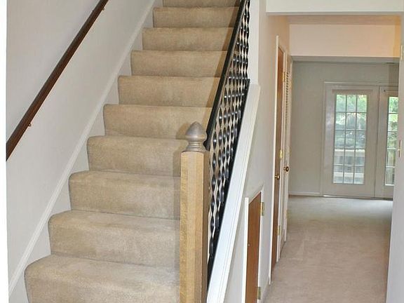 Two story living with two bedrooms upstairs.