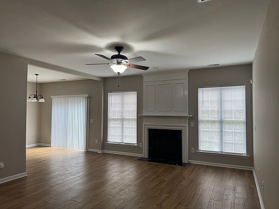 Open family room connected to the dining room. All new blinds