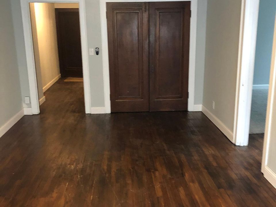 Beautifully reclaimed hardwood floors run throughout the unit.
