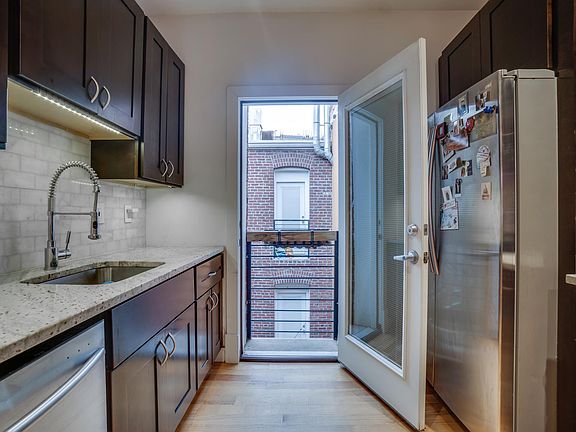 Granite Countertops & Dark Wood Cabinetry