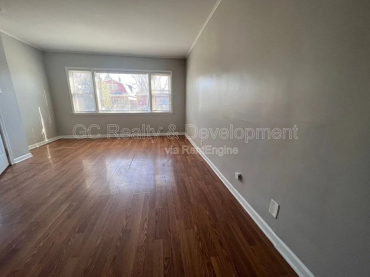 Building Photo - 8336 S Kingston Ave #1