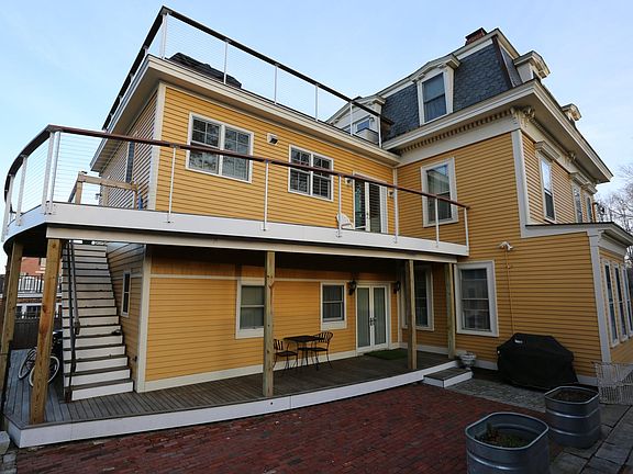 First floor patio, deck and entry