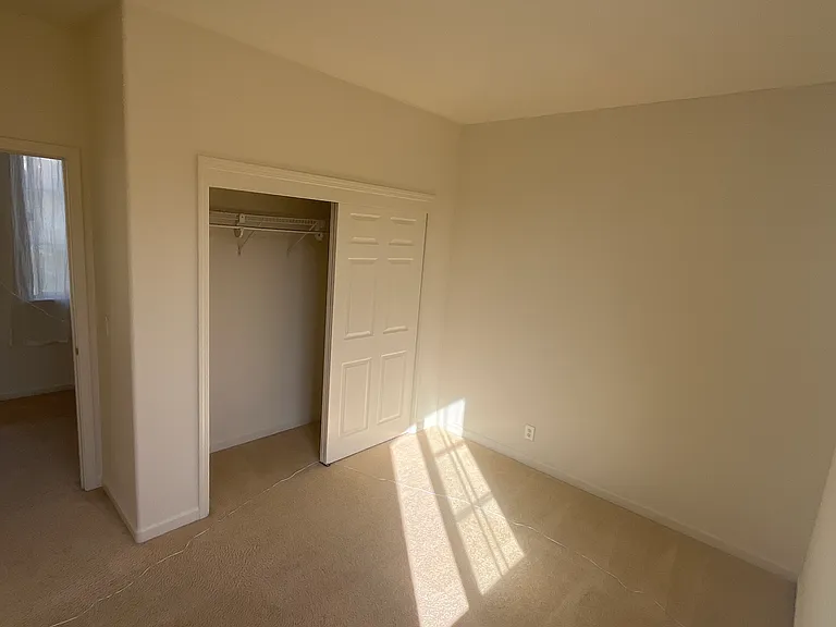 Bedroom 1 at top of stairs has double closet 1 window