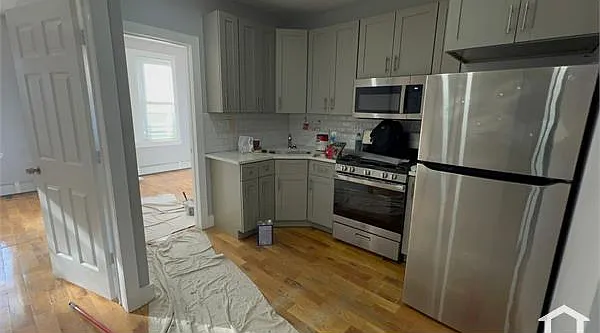11339 Farmers Blvd #1 — Photo 1