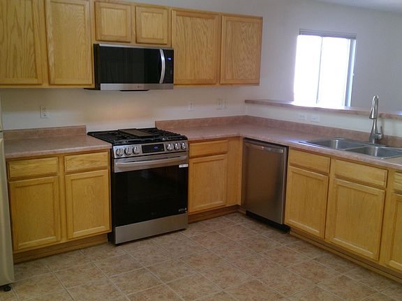 5th image of 10927 Tanzanite Dr NW