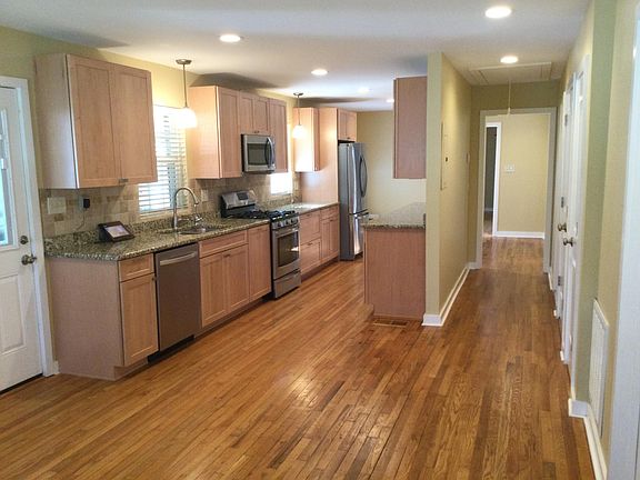 Nicely appointed kitchen with gas range.