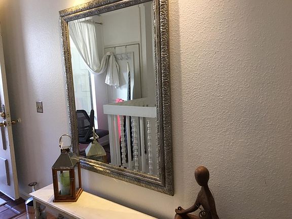 1st floor entry with current tenant's furniture.