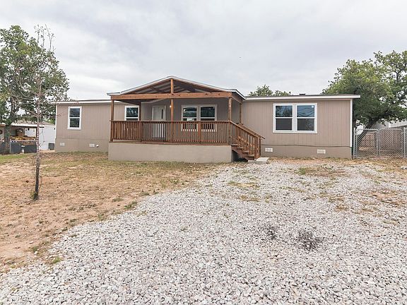 front house with long driveway