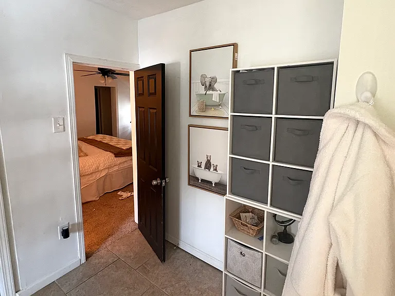 En suite primary bathroom - very spacious with room for storage