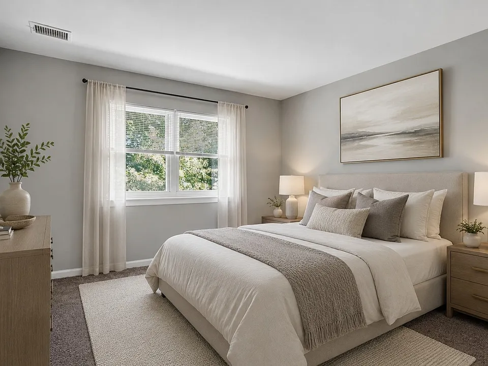 Unwind in the elegantly designed bedroom at Miry Run Apartments, where comfort meets style. Enjoy natural light streaming through large windows and modern finishes throughout. Elevate your living experienceschedule a tour today!