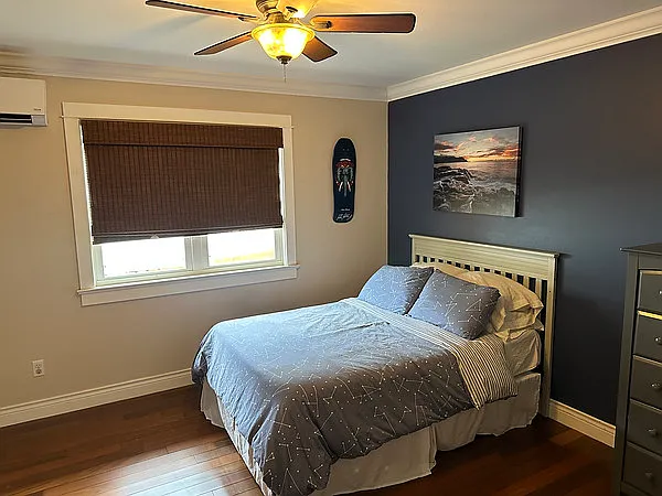 One of three bedrooms
