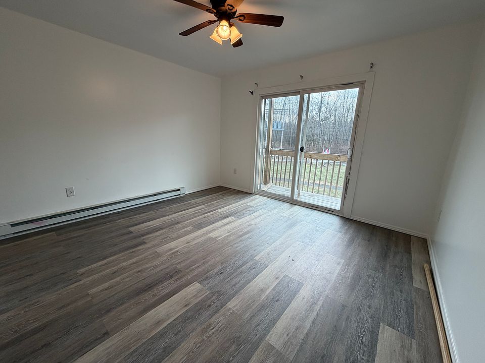 Primary bedroom with private balcony and extra large closet