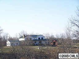 view from the road of the house & Barn