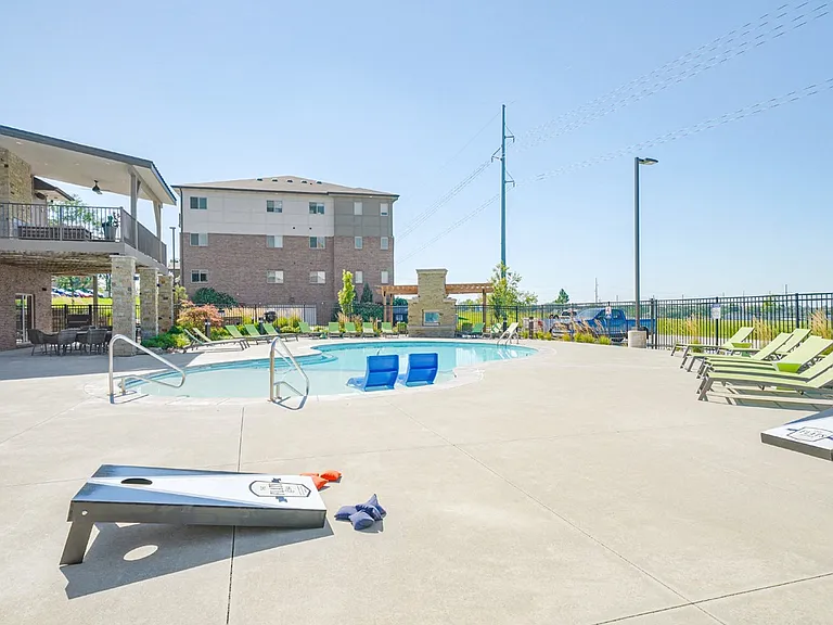 Unwind poolside in our outdoor oasis, complete with lounge seating, a hot tub, and plenty of space to soak up the sun.