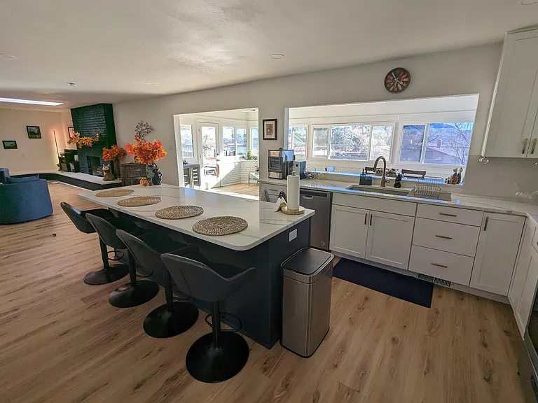 Kitchen, perspective from laundry room entry.
*pictured furniture to show depth and dimension, furniture not included