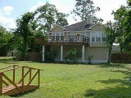 DISTINCTIVELY DIFFERENT....THIS HOME IS LOCATED WITHIN A SHORT DISTANCE OF I45 IN DICKINSON, MIDWAY 