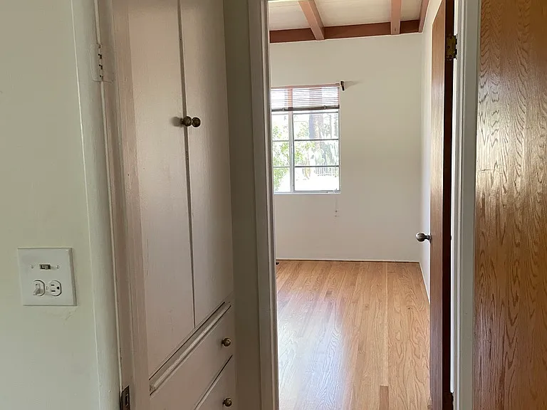 Hallway outside master bedroom, doorway to bedroom 2