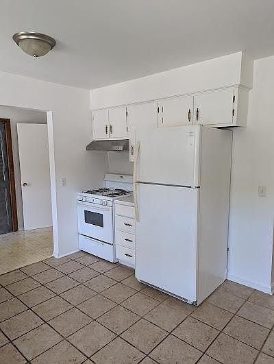 Gas stove, new hood, and a larger refrigerator.
