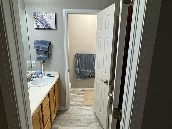 shared upstairs bathroom with double vanity