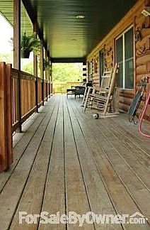 Generous Porch and Wrap around Deck