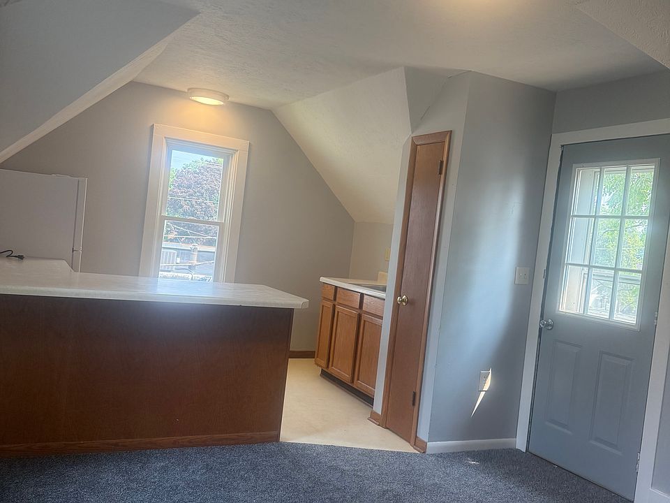 Cozy kitchen open to Living space. Fresh paint and new carpet throughout.