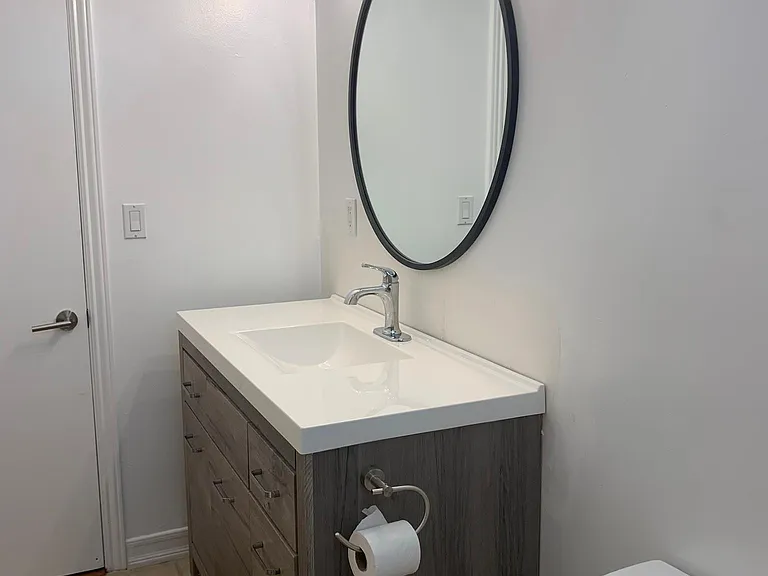 LARGE BATHROOM W/ NEW VANITY AND DESIGNER COUNTERTOP AND DESIGNER MIRROR & LIGHTING