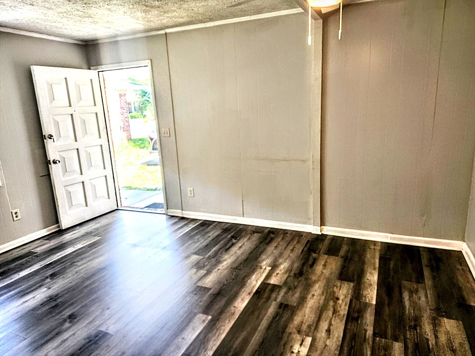 Living room with new LVP flooring throughout