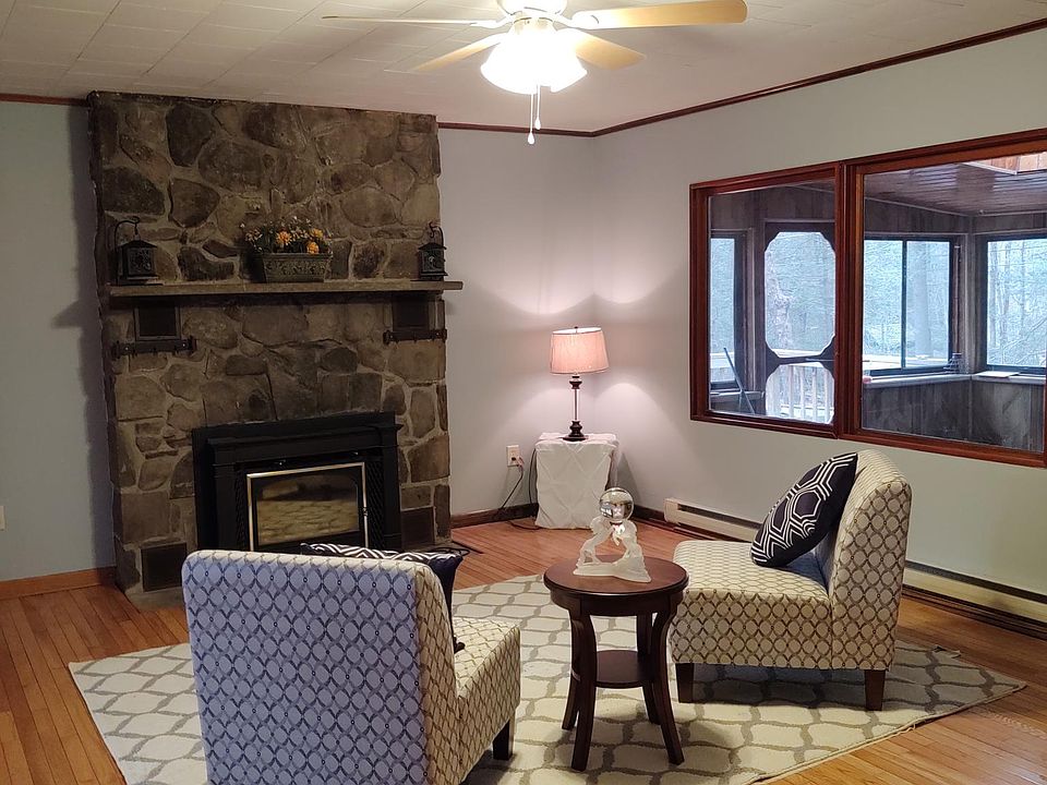 large fire place view to front pourch