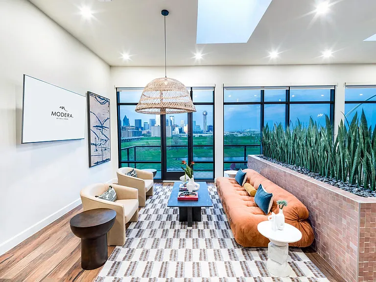 Lounge in style with skyline views_your rooftop escape at Modera Trinity awaits.