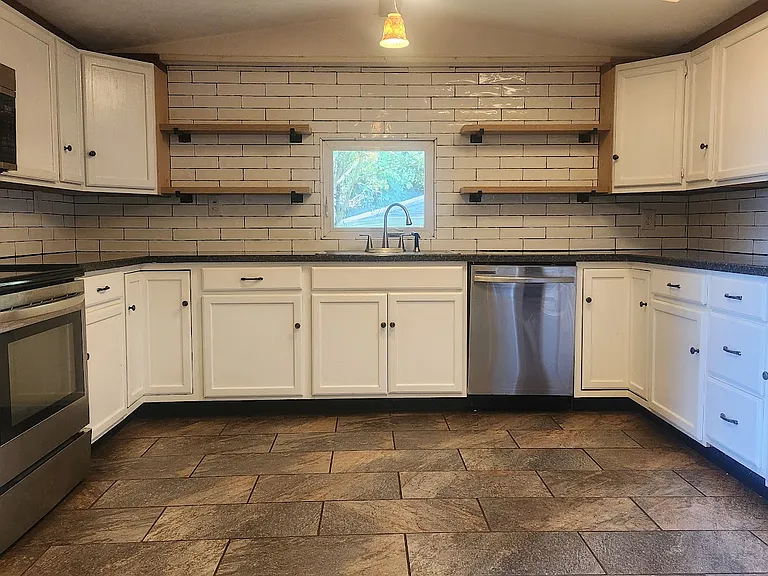 Professionally designed, updated kitchen. Beautiful view from the sink!
