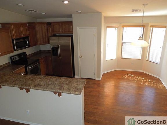 5th image of 10028 W Preston Ln