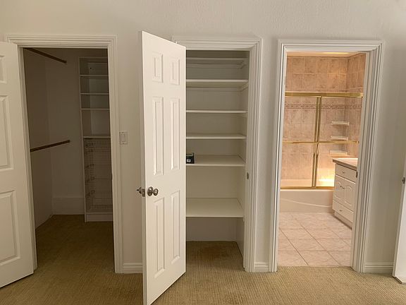 Master walk-in closet, storage and connected bath