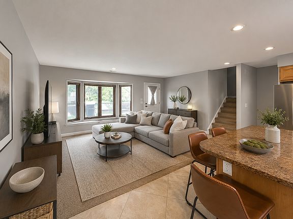Entry way, living room and kitchen