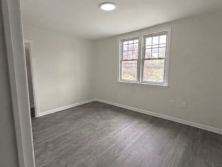 Second bedroom is spacious and has one closet.