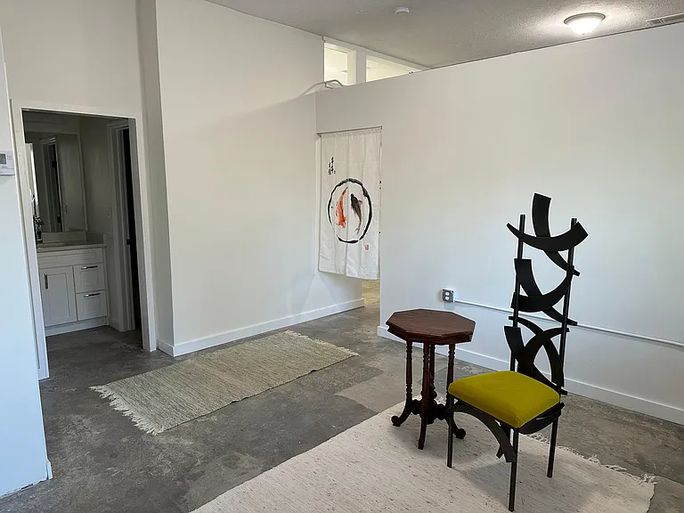 Den/Office looking towards Vanity, curtain goes to Bedroom, Laundry & Closet area, 11'4" x 12'11"...