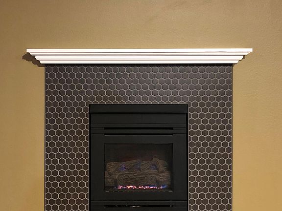 Cozy gas fireplace on main floor