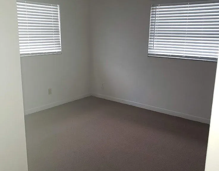 Back Bedroom with attached 1/2 bath.